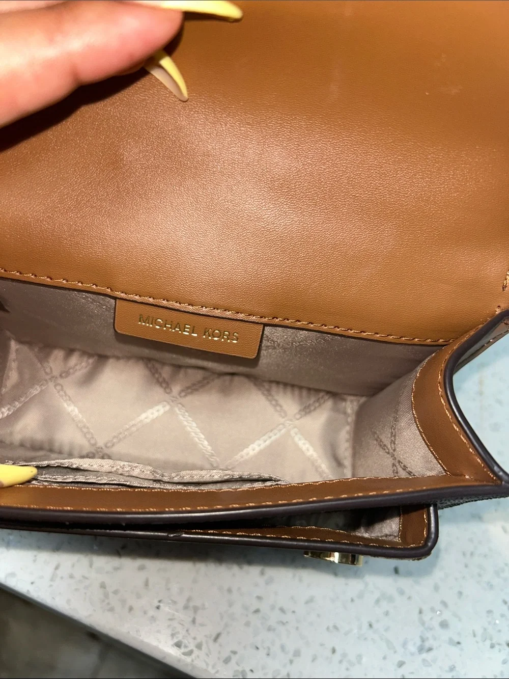 Like new Michael Kors Brown Logo Crossbody with Tan Leather and Gold Chain